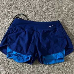 Nike Women's Dual Blue Athletic Shorts